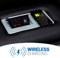 Wireless Charging Pad on the Fold-Down Table of the Seatcraft Colosseum